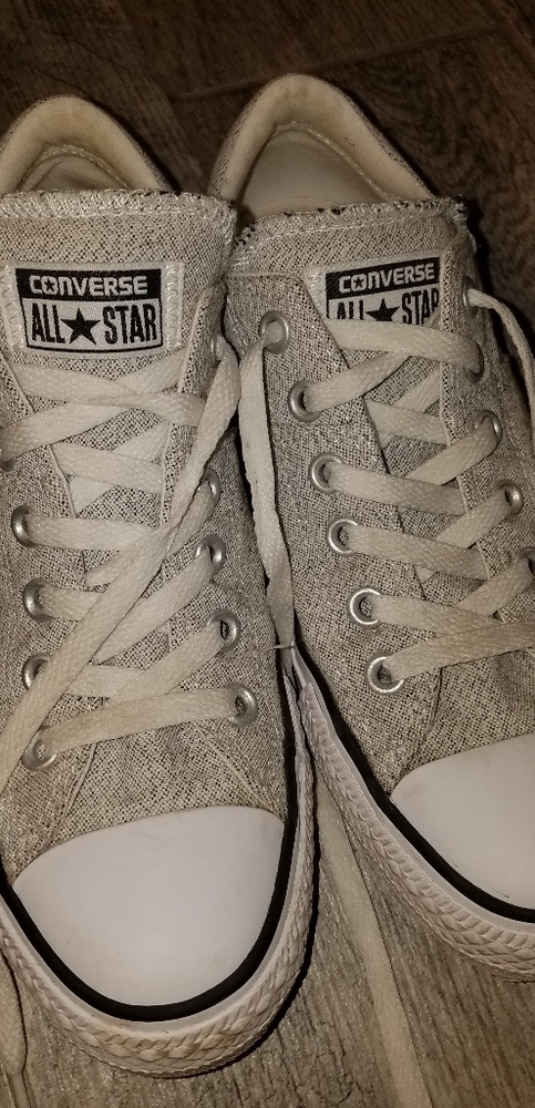 Gray and white converse all stars